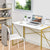 harper no assembly gold frame desk with white wood grain tabletop in a home office with laptop and chair